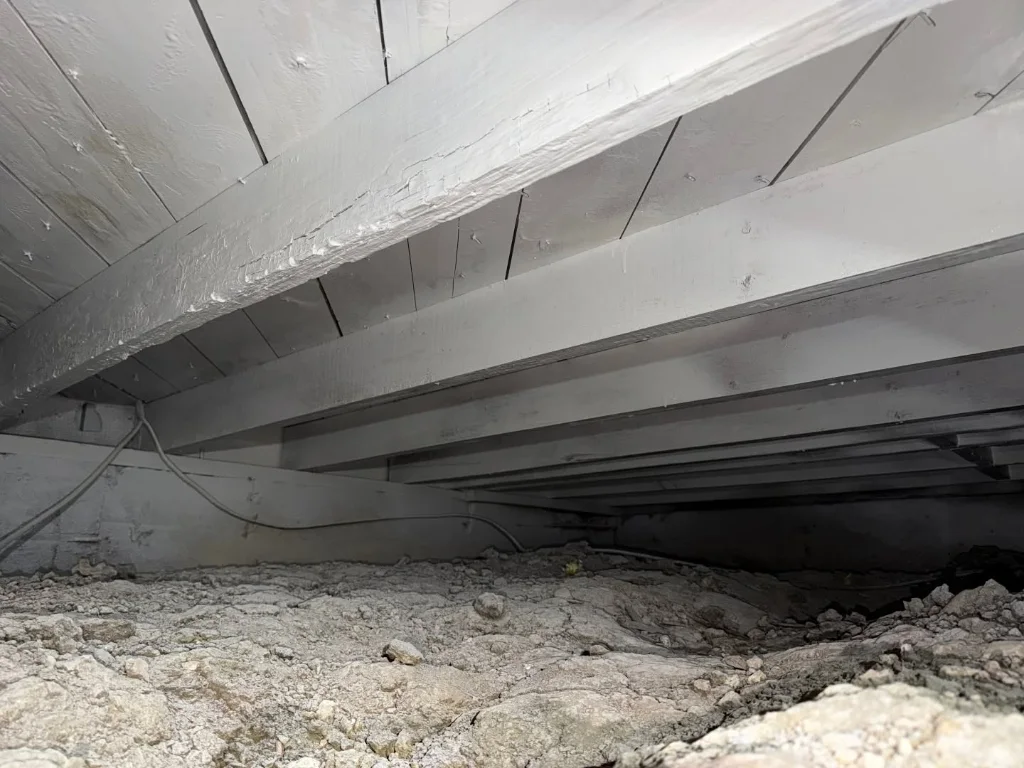 Sealed subfloor timbers and pier-and-beam crawl space framing in Dallas North Texas
