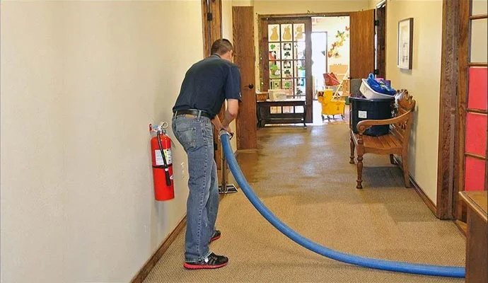 Deep carpet and concrete slab extraction wand in residential living area